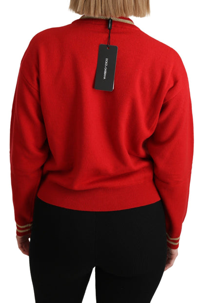 Strahlend roter Kaschmirpullover mit Cartoon-Motiv