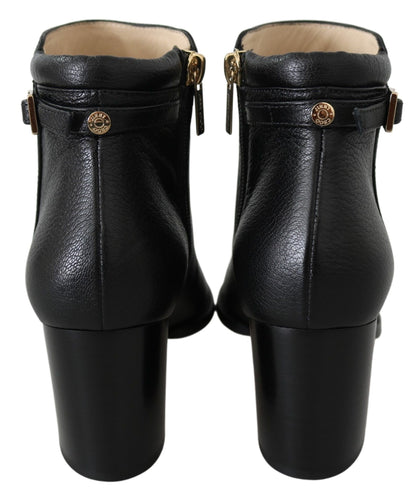 Elegante schwarze Lederstiefel mit Absatz