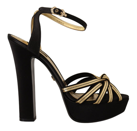 Elegante schwarze und goldene Sandalen mit Knöchelriemen