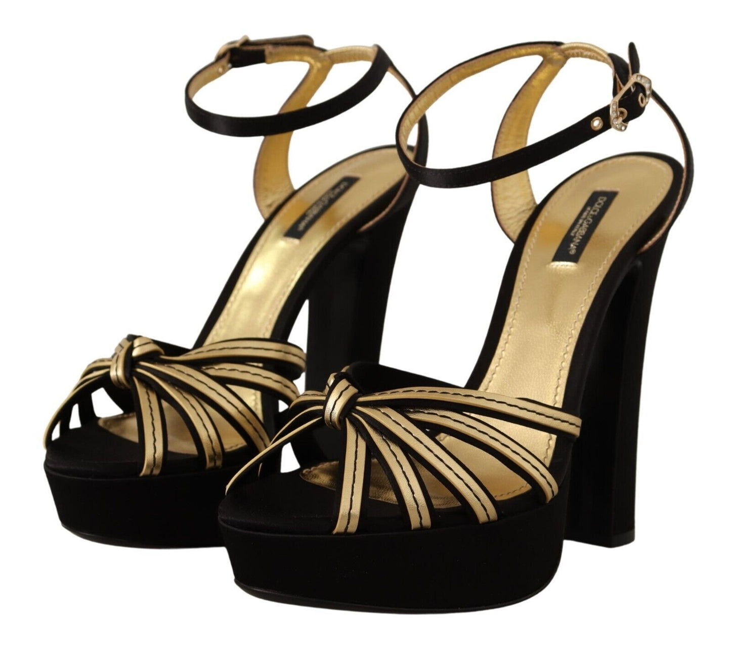 Elegante schwarze und goldene Sandalen mit Knöchelriemen