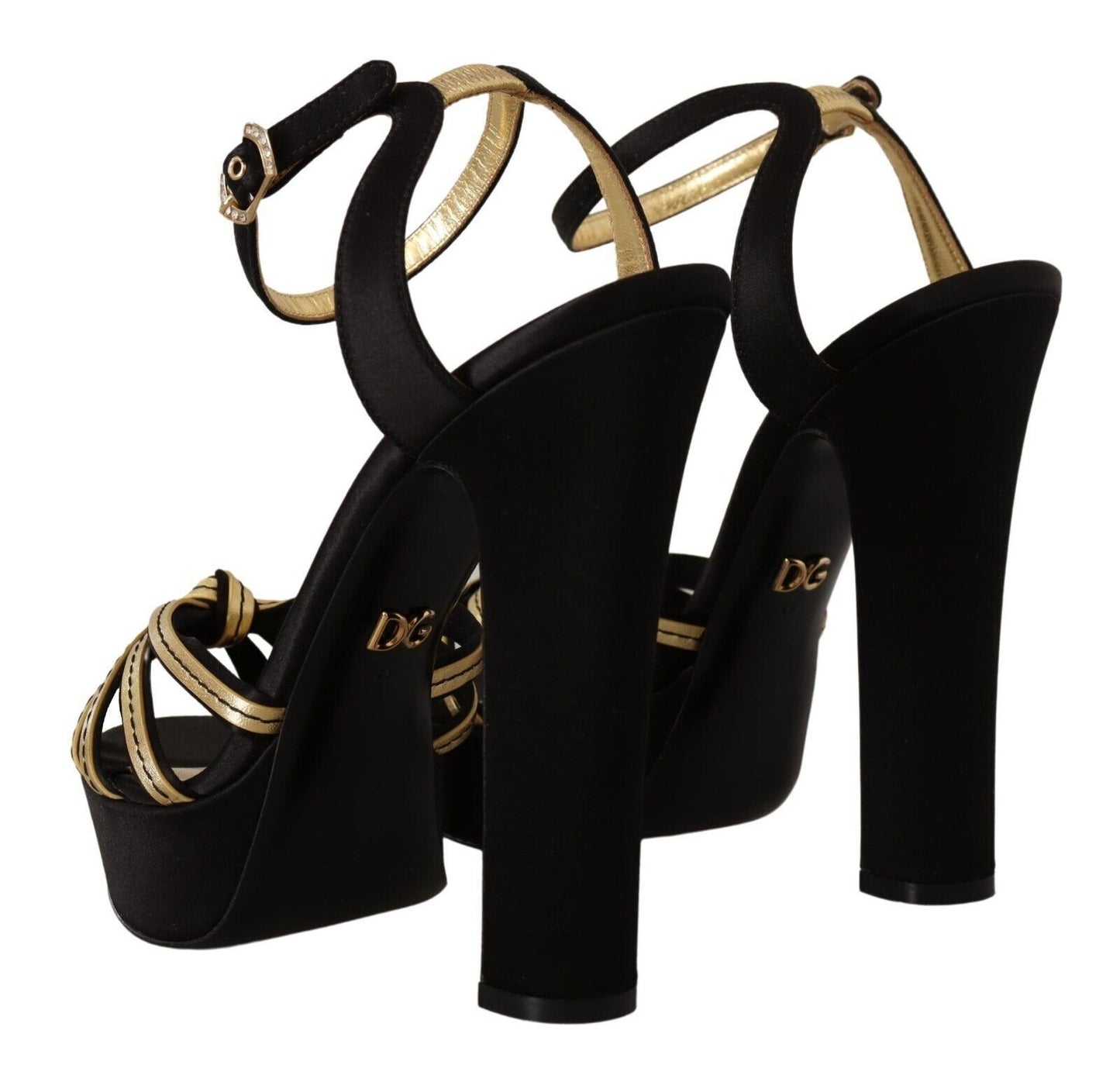 Elegante schwarze und goldene Sandalen mit Knöchelriemen