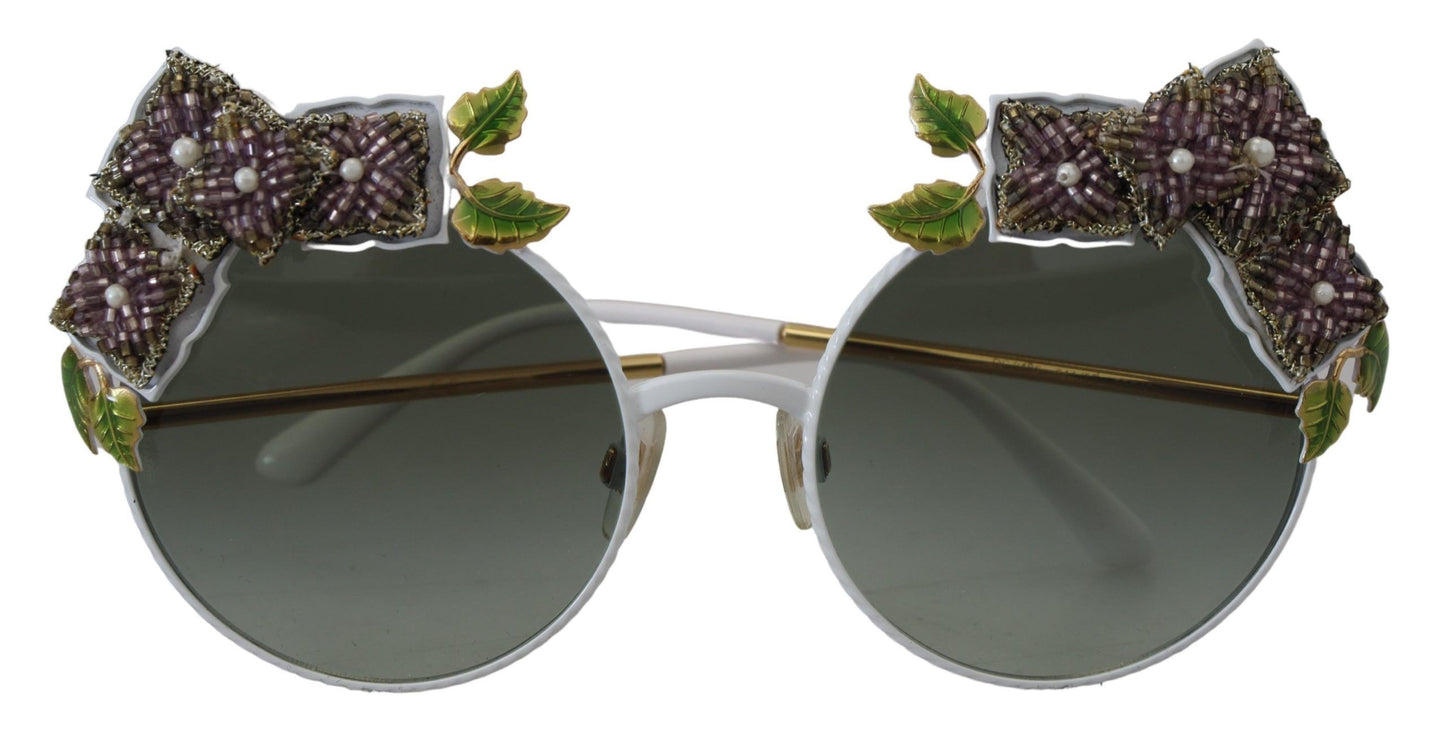 Elegante, mit Blumen verzierte goldene Sonnenbrille