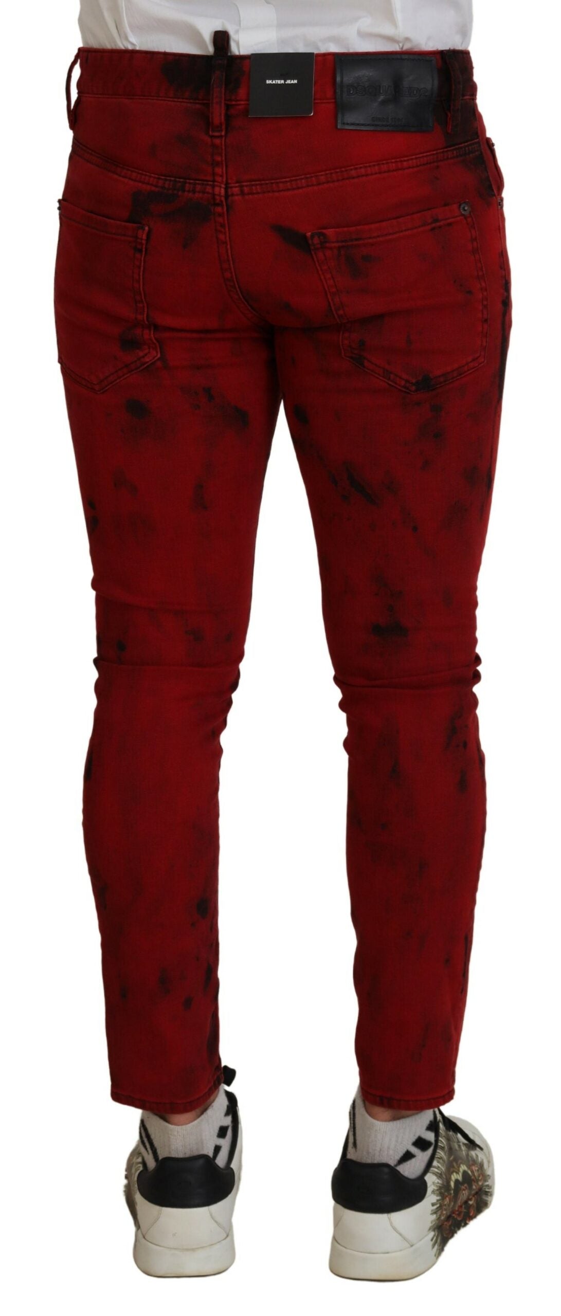 Rote, enge Jeans aus Baumwoll-Batikstoff