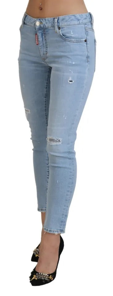 Blaue, zerfetzte, verkürzte Twiggy-Jeans aus Denim mit mittlerer Taille