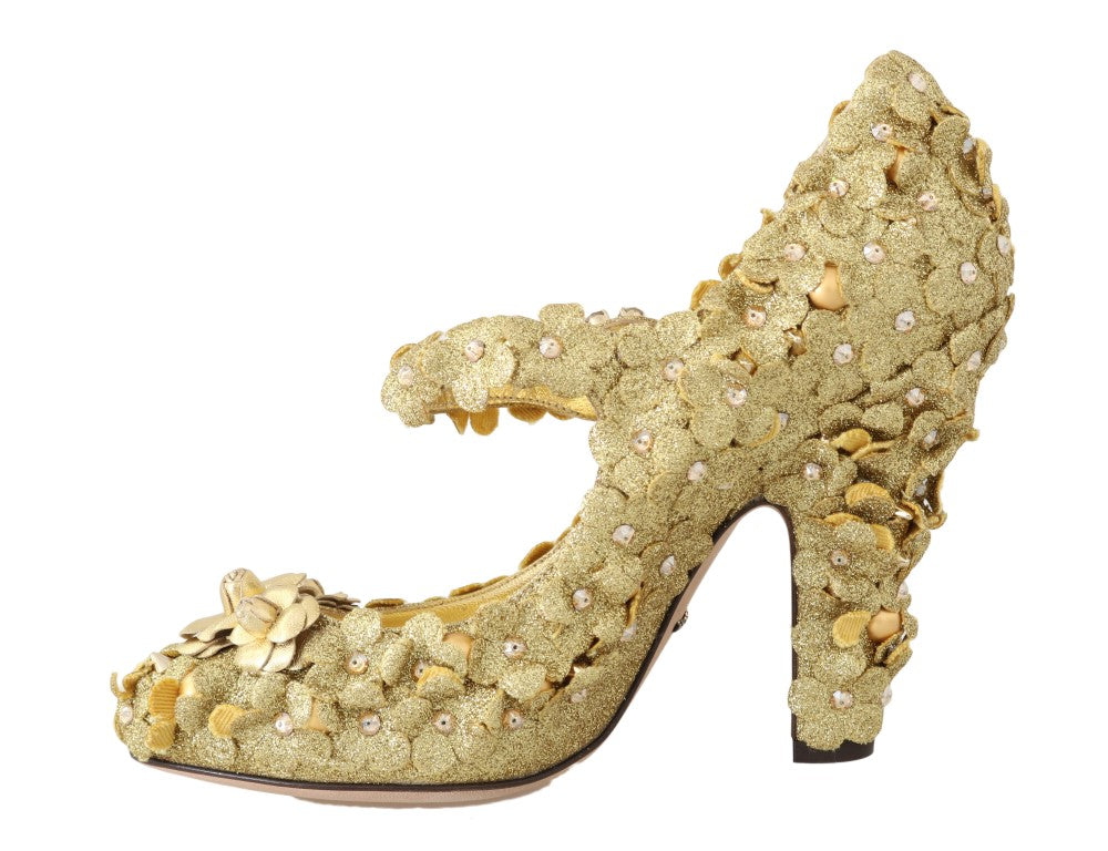 Goldene Pumps mit Blumen- und Kristallverzierung