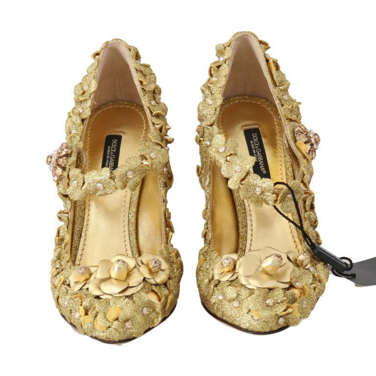 Goldene Pumps mit Blumen- und Kristallverzierung